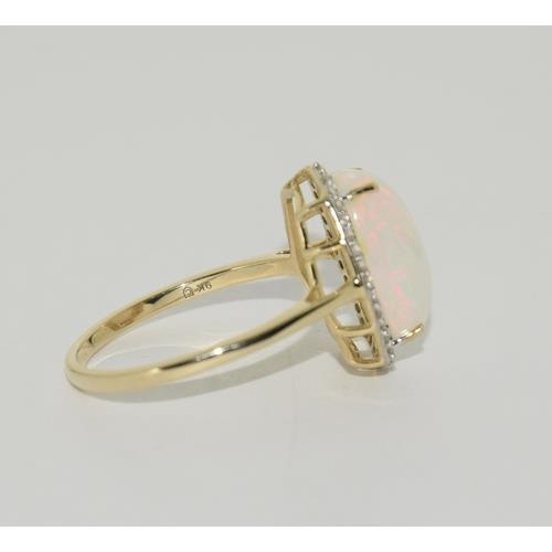 193 - 9ct Gold Opal white sapphire ring. Size T 1/2.