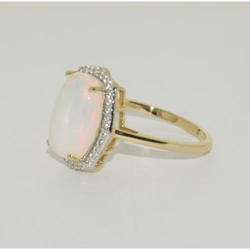 193 - 9ct Gold Opal white sapphire ring. Size T 1/2.