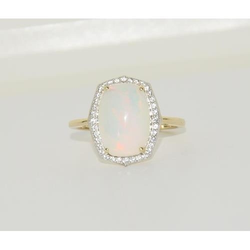 193 - 9ct Gold Opal white sapphire ring. Size T 1/2.