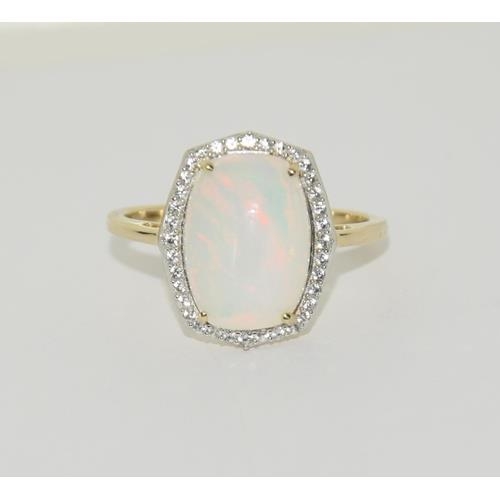 193 - 9ct Gold Opal white sapphire ring. Size T 1/2.