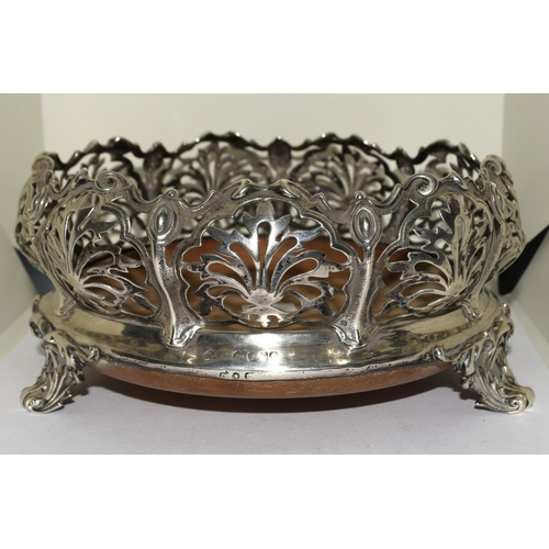 205 - Victorian large embossed centre table bowl or wine coaster standing on triple supports with embossed... 