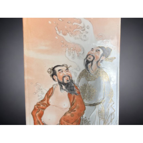 292 - A LARGE CHINESE PORCELAIN HAND PAINTED WALL PLAQUE.
DEPICTING TWO DAOIST IMMORTALS.
MOUNTED ON WOODE... 