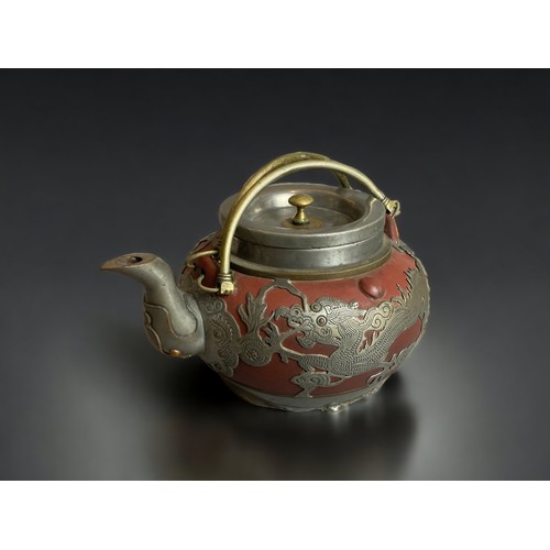 305 - A CHINESE PEWTER OVERLAY YIXING TEAPOT. 
EARLY 20TH CENTURY.
DEPICTING DRAGONS CHASING THE PEARLY AM... 