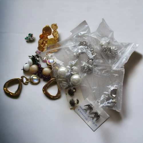 187 - A LARGE LOT OF MATCHED PAIRS CLIP ON EARRINGS.