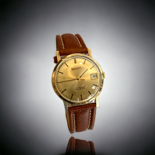 189 - A 1970's SWISS IMADO 9CT GOLD MENS WRISTWATCH.
17 JEWELS, INCABLOC.
BIRMINGHAM 1978 HALLMARKS. 
WITH... 