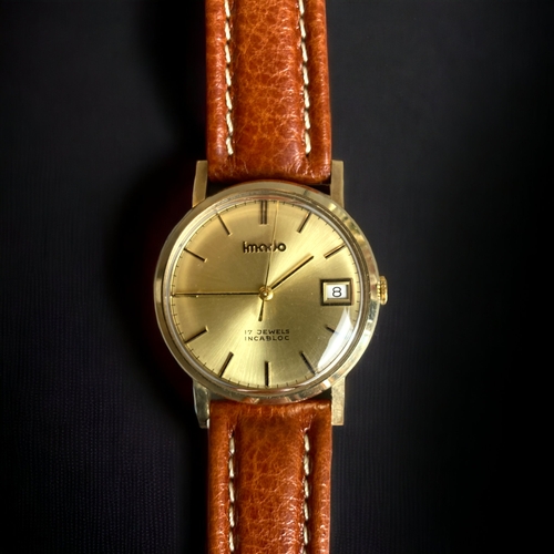 189 - A 1970's SWISS IMADO 9CT GOLD MENS WRISTWATCH.
17 JEWELS, INCABLOC.
BIRMINGHAM 1978 HALLMARKS. 
WITH... 