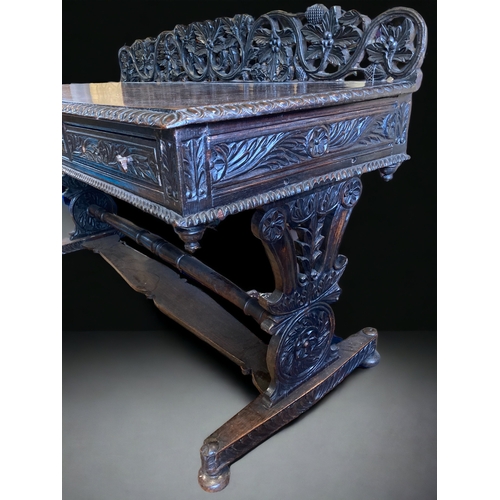 39 - A MID VICTORIAN ANGLO-INDIAN PADOUK WOOD SIDEBOARD. ELABORATELY HAND-CARVED FOLIATE DESIGN.