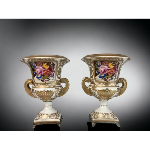 314 - A PAIR OF HAND PAINTED PORCELAIN CAMPANA VASES. 20TH-CENTURY.
HAND PAINTED PANELS DEPICTING SPRAYS O... 