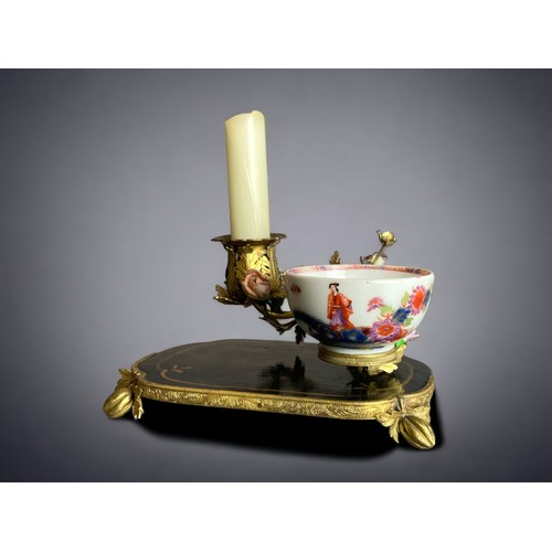 320 - A scarce Louis XV type Continental porcelain tea bowl & candlestick centrepiece. 18th-century.
Mount... 