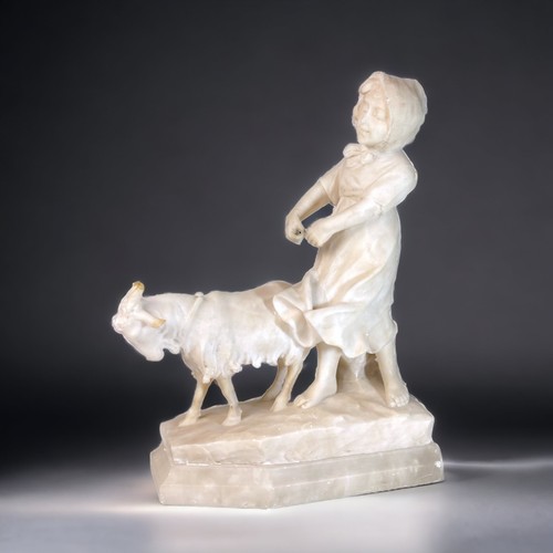 300 - AN ITALIAN CARVED MARBLE STATUE. DEPICTING A YOUNG FARM GIRL AND A GOAT.  SAT ON AN ALABASTER BASE. ... 