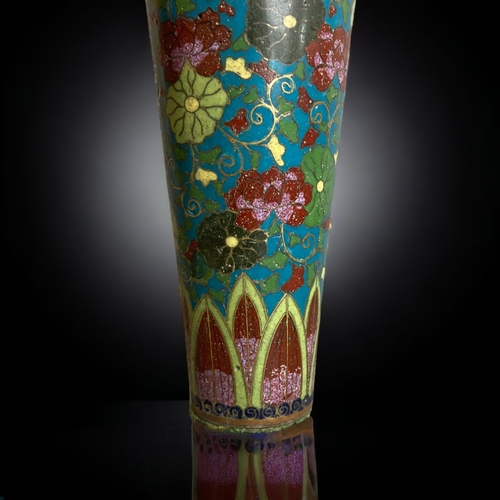 239 - A JAPANESE CLOISONNÉ VASE.
MEIJI PERIOD. 
TAPERED FORM WITH BLOSSOMING FLOWERS. 
16CM TALL