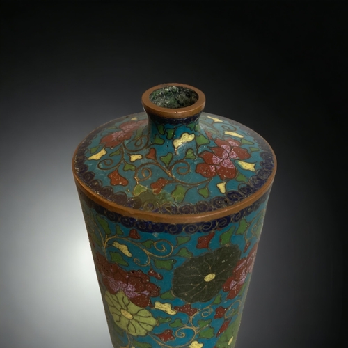 239 - A JAPANESE CLOISONNÉ VASE.
MEIJI PERIOD. 
TAPERED FORM WITH BLOSSOMING FLOWERS. 
16CM TALL