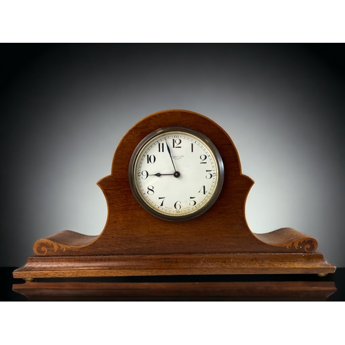 293 - AN EARLY 20TH CENTURY FRUITWOOD INLAID MANTLE CLOCK. 
18 X 33CM