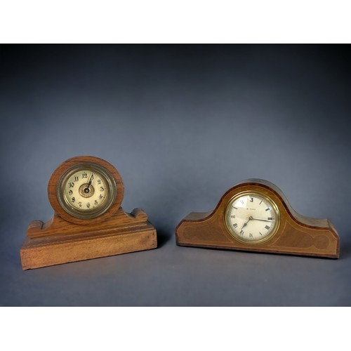 294 - TWO EARLY 20TH CENTURY MANTLE CLOCKS. 
LARGEST - 19 X 23.5 CM