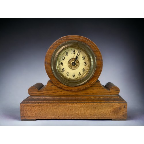 294 - TWO EARLY 20TH CENTURY MANTLE CLOCKS. 
LARGEST - 19 X 23.5 CM