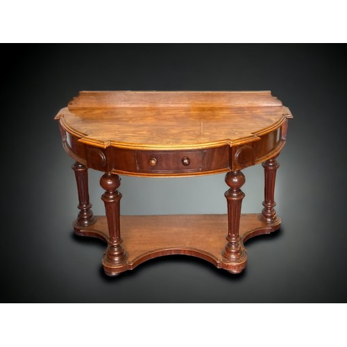 10A - A VICTORIAN MAHOGANY DEMI-LUNE CONSOLE TABLE. CARVED BALL LEGS WITH SINGLE FRIEZE DRAWERS.