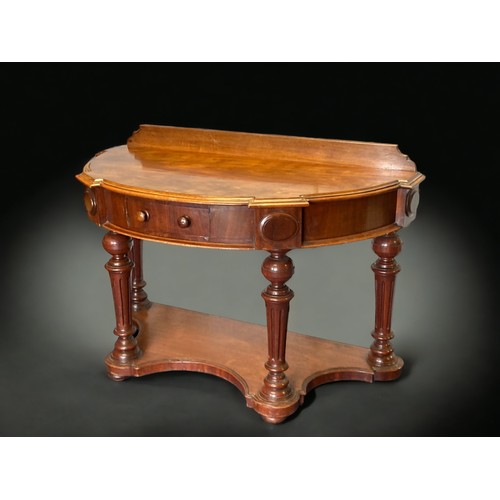 10A - A VICTORIAN MAHOGANY DEMI-LUNE CONSOLE TABLE. CARVED BALL LEGS WITH SINGLE FRIEZE DRAWERS.