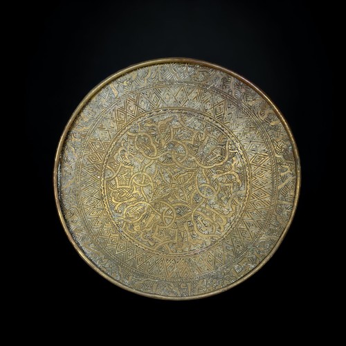 40B - A PERSIAN BRASS TRAY, TOGETHER WITH ONE OTHER TRAY.