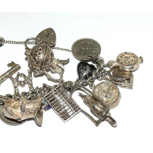 203 - Large silver charm bracelet and charms approx 20, 100g