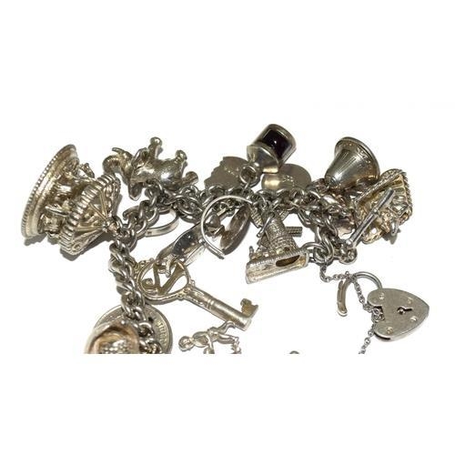 203 - Large silver charm bracelet and charms approx 20, 100g