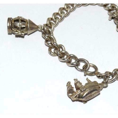 27 - Silver charm bracelet and charms each chain link individually H/M