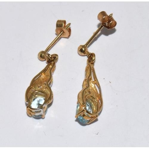 134 - 9ct gold diamond and Topaz earrings and matching pendant necklace