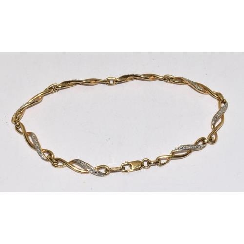 237 - 9ct gold and diamond Celtic style lobster claw bracelet with diamond insert. 7 inches long