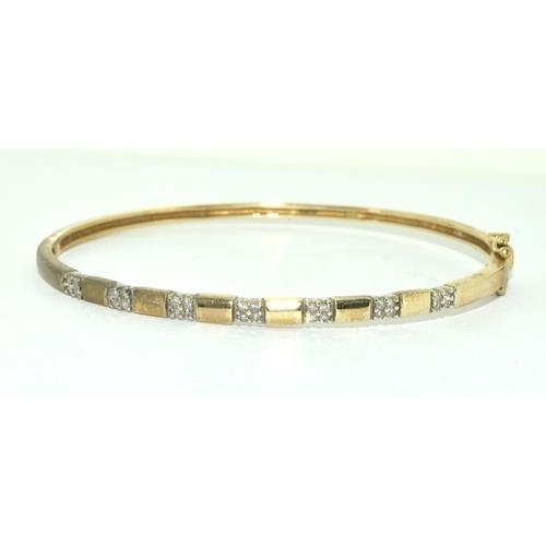 194 - 9ct gold Diamond set bangle 8.5g