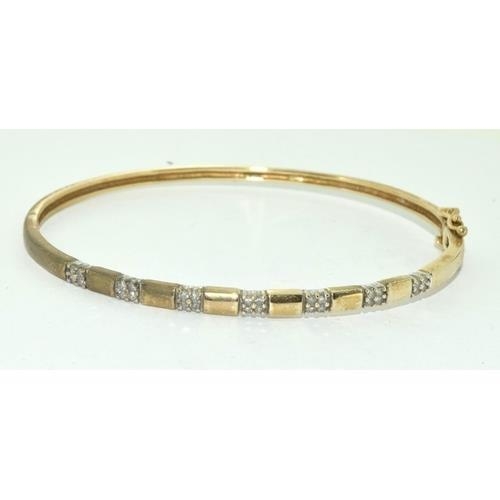 194 - 9ct gold Diamond set bangle 8.5g