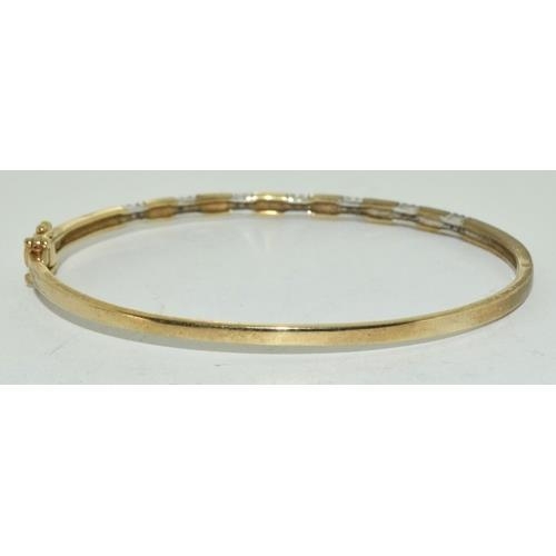 194 - 9ct gold Diamond set bangle 8.5g