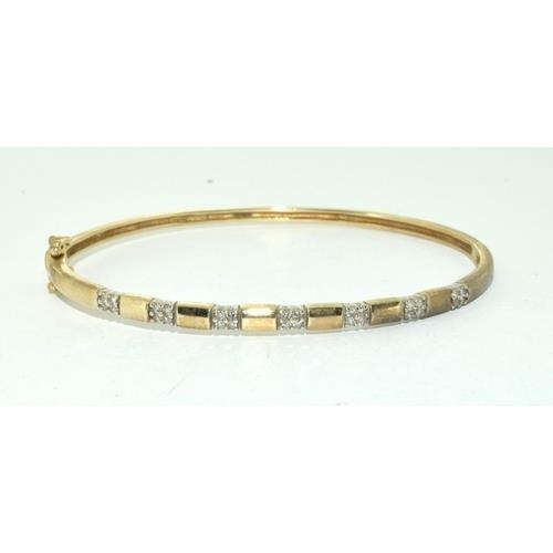 194 - 9ct gold Diamond set bangle 8.5g