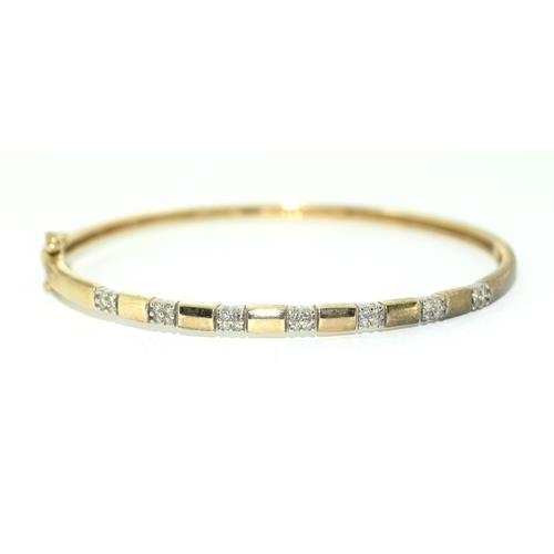 194 - 9ct gold Diamond set bangle 8.5g