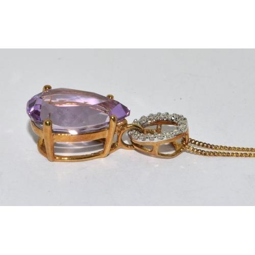 79 - 9ct gold Amethyst and diamond pendant necklace