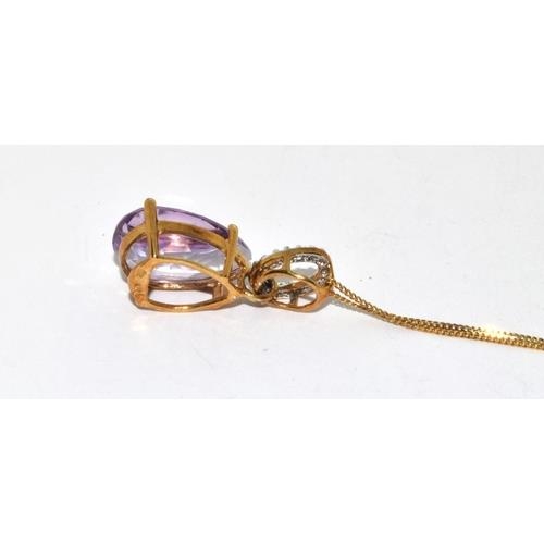 79 - 9ct gold Amethyst and diamond pendant necklace