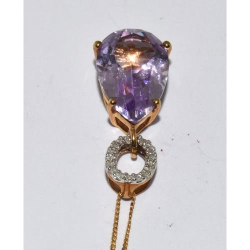 79 - 9ct gold Amethyst and diamond pendant necklace