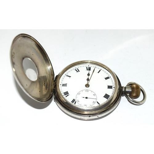 187 - Silver top wind  half hunter pocket watch 50mm, running when catalogued