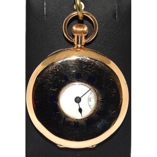 280 - 9ct gold side wind half hunter pocket watch set with enamel face and roman numerals with subsidiary ... 