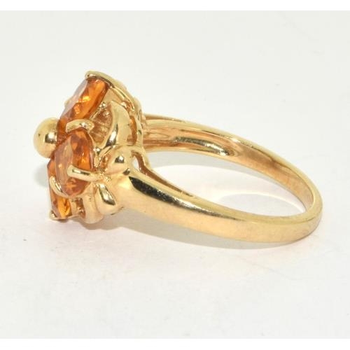 292 - 9ct gold ladies Amber daisy ring 5.5g size N