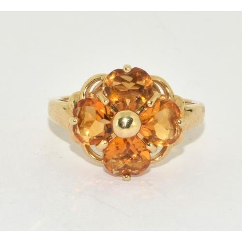 292 - 9ct gold ladies Amber daisy ring 5.5g size N