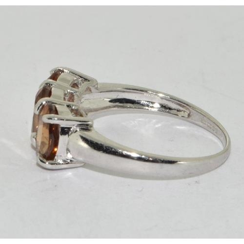 33 - 9ct white gold ladies 3 stone Amber ring size N