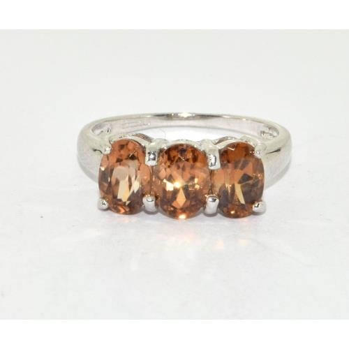 33 - 9ct white gold ladies 3 stone Amber ring size N