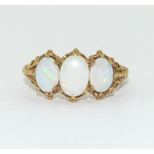 13 - 9ct gold ladies antique Opal trilogy ring in an ornate setting size Q