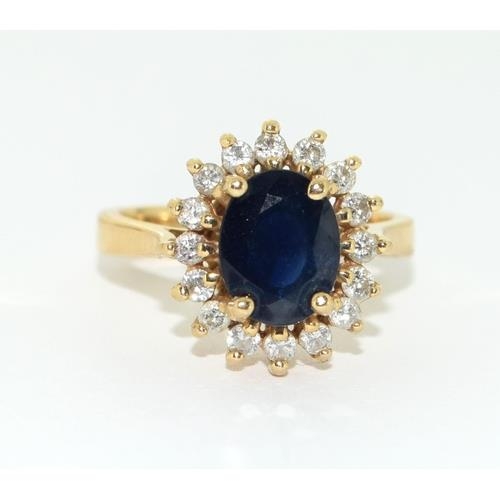 253 - 14ct gold Princess Diana style Sapphire and Diamond cluster ring size N