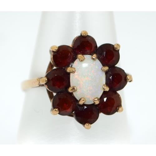 284 - 9ct gold ladies Garnet and Opal ring size N