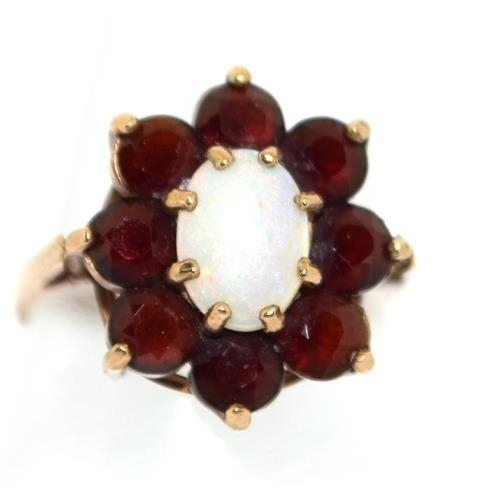 284 - 9ct gold ladies Garnet and Opal ring size N