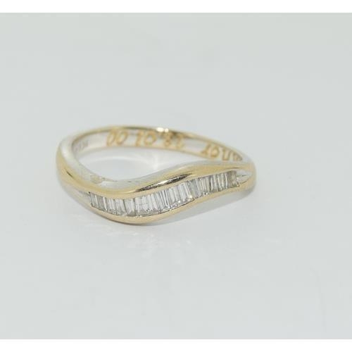 282 - 18ct gold Diamond wave set ring with baguette cut diamond approx 1ct size O