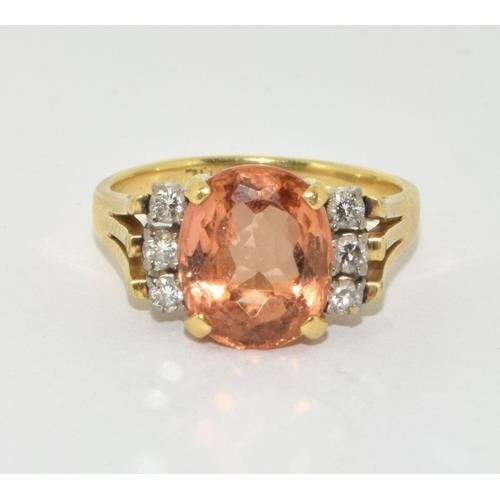 238 - 18ct gold ladies Diamond and Kunsanite ring with scroll setting size L