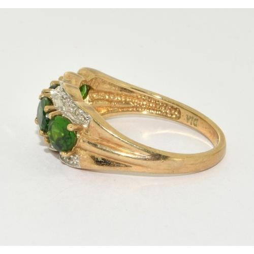 99 - 9ct gold ladies Diamond and emerald green stone ring size P