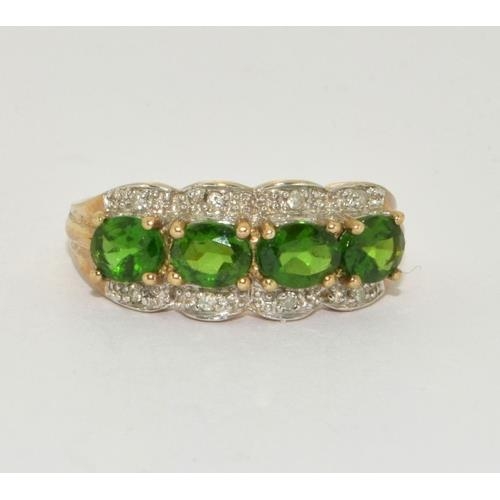 99 - 9ct gold ladies Diamond and emerald green stone ring size P