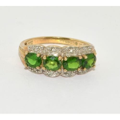 99 - 9ct gold ladies Diamond and emerald green stone ring size P